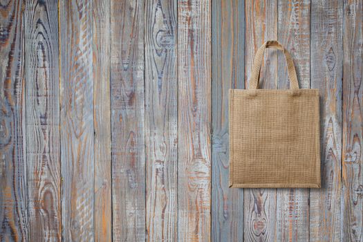 eco bag for shopping on wooden background