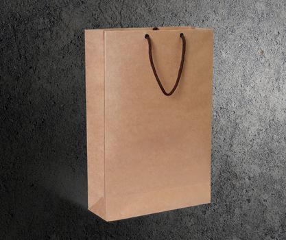 paper bag for shopping on a dark background