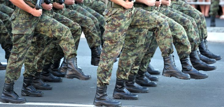 Close up view on Serbian Army marches during parade