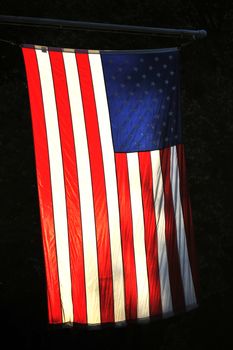 American flag on the sun in the shadow
