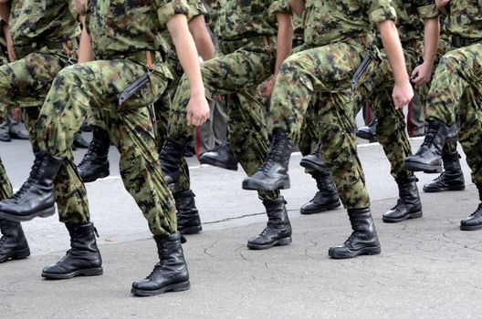 Close up view on Serbian Army marches during parade