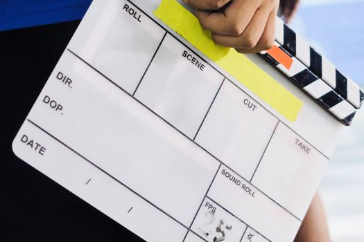 Film Slate, close up image of film production crew holding Film Slate on set