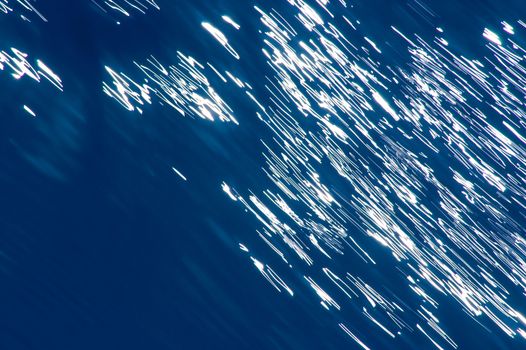 Blurred blue, white and blue diagonal background