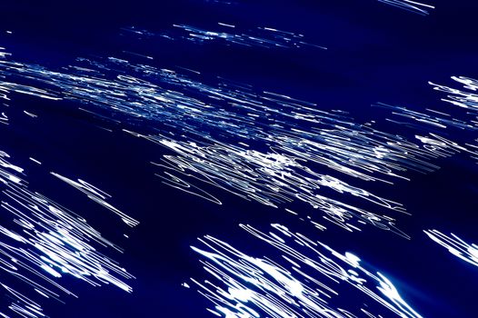 Blurred blue, white and black diagonal background