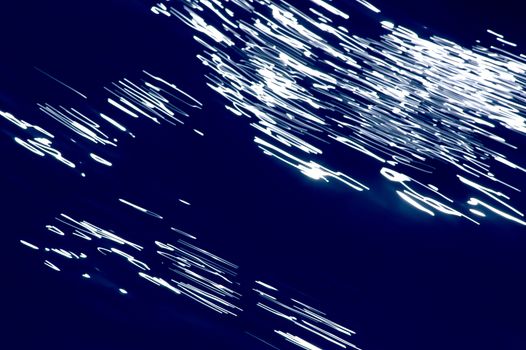 Blurred blue, white and black diagonal background