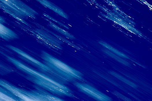 Blurred blue, white and black diagonal background