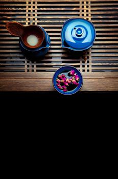 Chinese Tea rose studio quality dark background