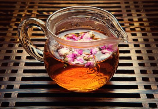 Chinese Tea rose studio quality dark background