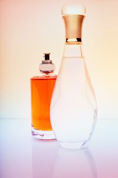 Glass perfume bottle white background studio