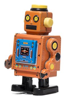 Vintage tin robot toy isolated on a white background.