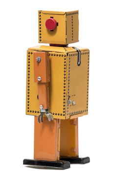 Vintage tin robot toy isolated on a white background.