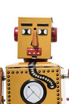 Vintage tin robot toy isolated on a white background.