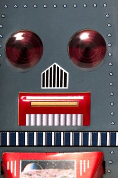 Vintage tin robot toy extreme close up.