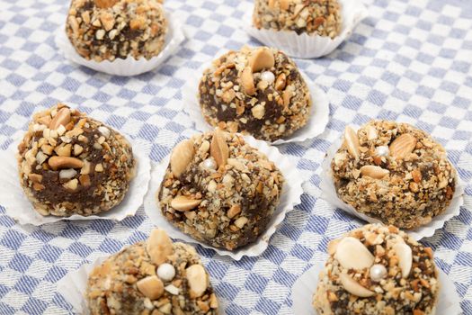 Traditional portuguese sweet of fig, carob and almond balls.