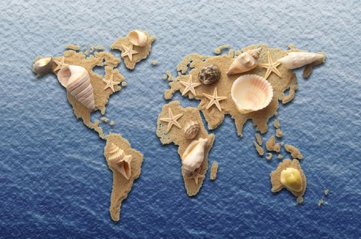 World atlas made from sand and sea shells on a sea background