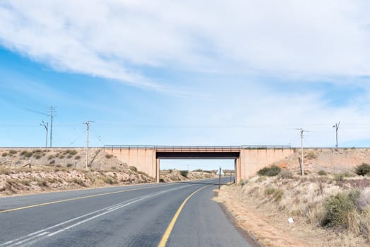 The Sishen-Saldanha railroad crossing the N10-road near Groblershoop in the Northern Cape Province