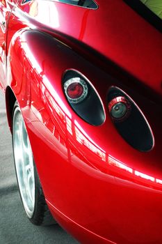 Close up detail of red sport car