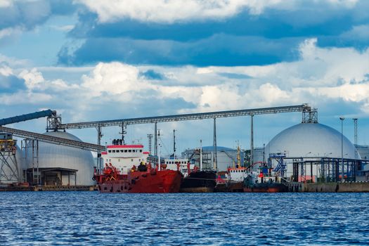 Cargo bulker ships are moored in Riga city at cargo terminal