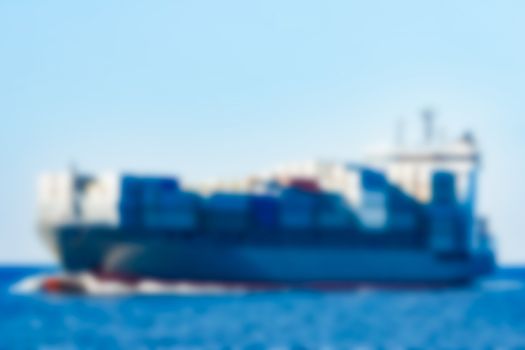 Cargo ship - soft lens bokeh image. Defocused background