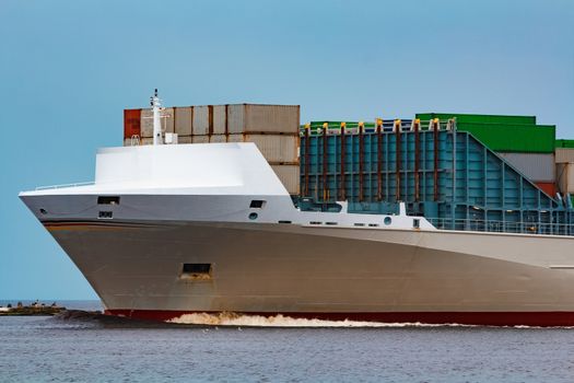 Grey container ship. Logistics and production import