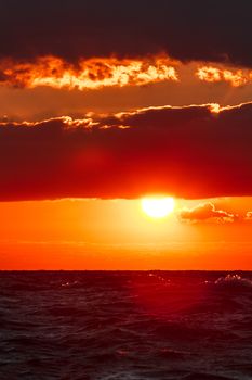 Hot and romantic sunset over the Baltic sea. Calm landscape