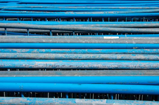 Horizontaly placed stainless steel tubes il blue color