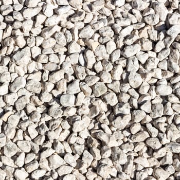 The image of a texture of white stones could have multiple uses, could also be used as wallpaper.