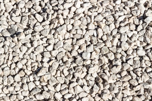 The image of a texture of white stones could have multiple uses, could also be used as wallpaper.