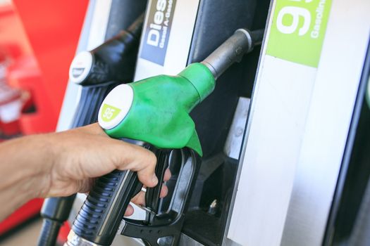 Man refilling his gasoline car