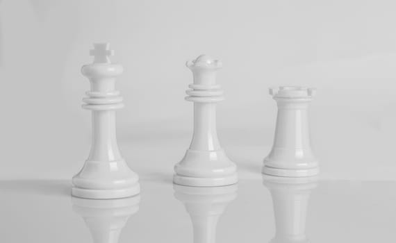 Isolated chess pieces in Black and white