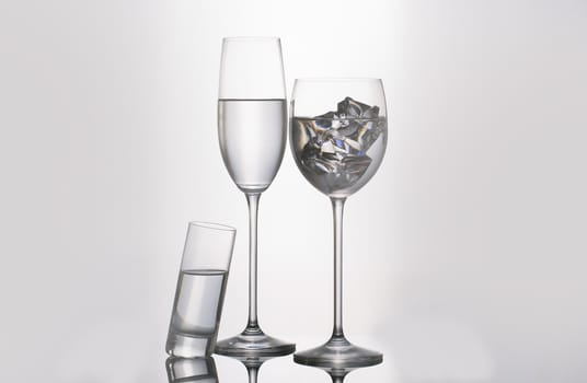 Isolated glass  and cup of water
