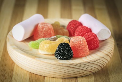 Sweets  candy in a wooden table