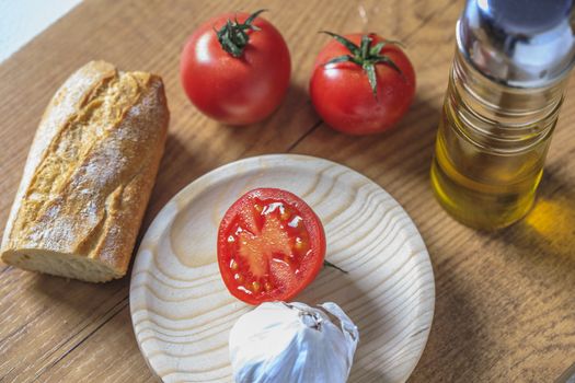 Tipical catalonial breakfast with bread,tomato and oil