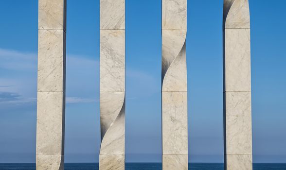 Columns in Barcelona beach
