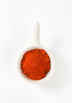 Ground Red Pepper in small white dish