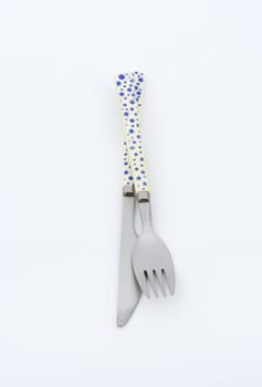 Dinner knife and fork with dotted handles