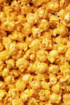 close up of golden cheese popcorn food background