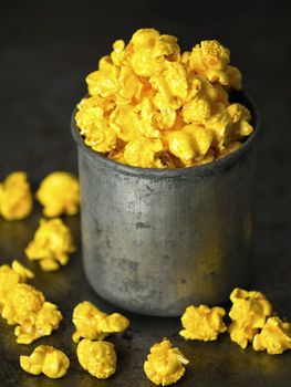 close up of rustic golden cheese popcorn