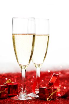 Two glasses of champagne with red decor, Valentines day concept