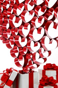 White boxes with red ribbons and decorative hearts isolated on white background