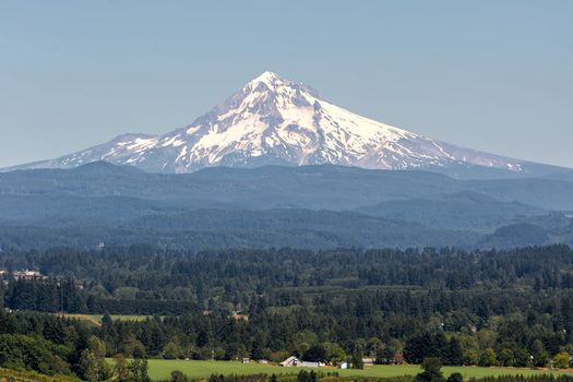 Mount Hood in Clackamas County Oregon during a blue sky summer day