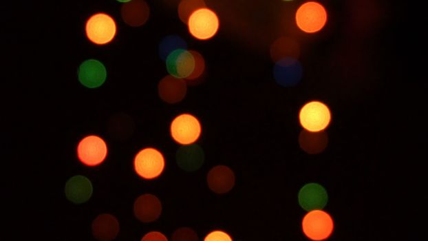 Glare from the garland out of focus.