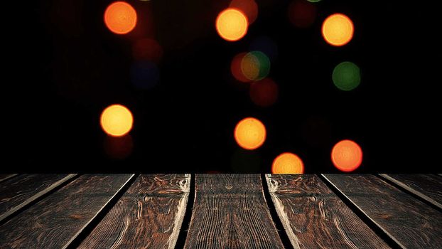 Perspective wood and bokeh background of night and the shimmering glare of the lights. display template item.