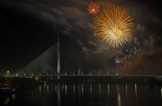Fireworks above Ada bridge in Belgrade at night