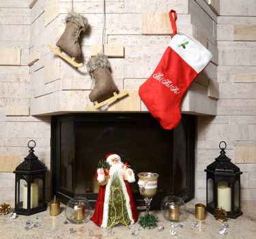 Christmas stockings hanging over the fireplace at midnight on Christmas Eve