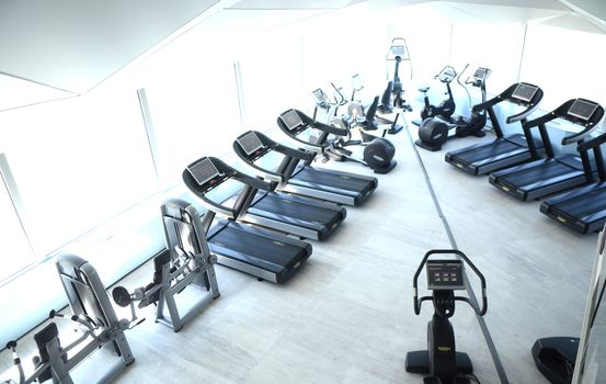 View on modern empty large gym with lot of weights