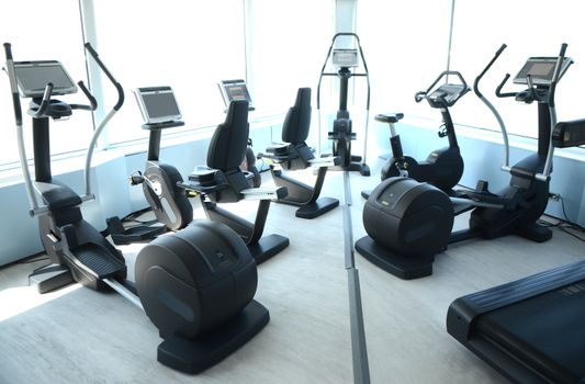 View on modern empty large gym with lot of weights