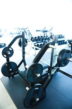 View on modern empty large gym with lot of weights