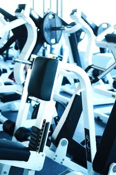 View on modern empty large gym with lot of weights