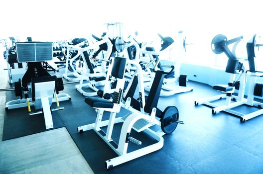 View on modern empty large gym with lot of weights